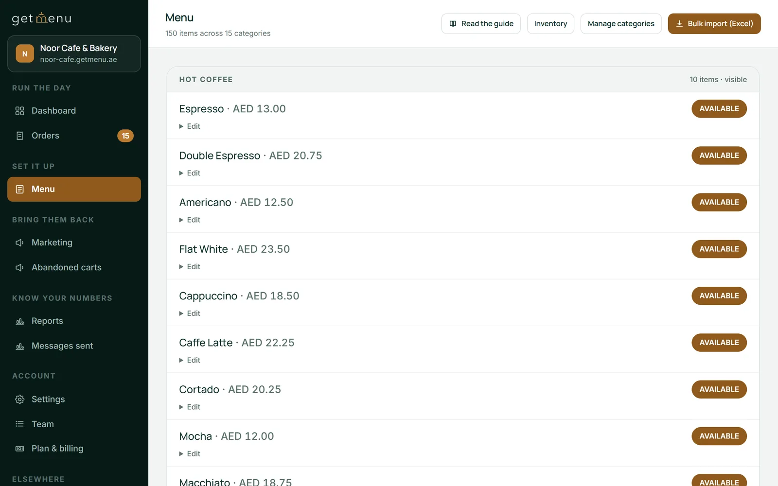 The GetMenu dashboard's Menu page for Noor Cafe & Bakery, the demo restaurant: 150 items across 15 categories, the Hot Coffee items with their prices and Available badges, and buttons for Inventory, Manage categories and Bulk import from Excel.