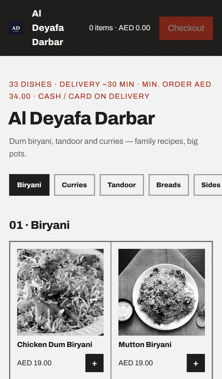 A demo restaurant's ordering page on a phone, in a two-column photo grid with category buttons and two biryani dishes.